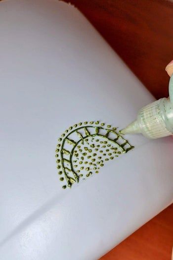 旧瓶变花盆：环保手工DIY教程-第16张图片-趣作屋