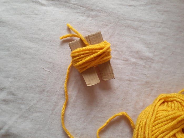 手把手教你制作毛线球花环装饰品-第4张图片-趣作屋 手把手教你制作毛线球花环装饰品-第4张图片-趣作屋