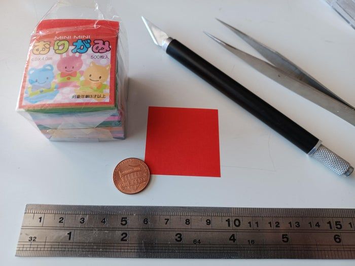 挑战手工极限：用4x4厘米纸折迷你千纸鹤教程-第3张图片-趣作屋