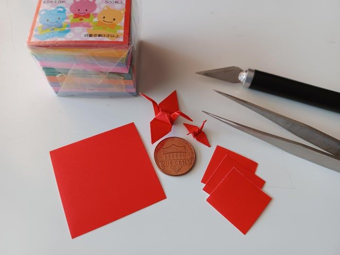 挑战手工极限：用4x4厘米纸折迷你千纸鹤教程-第10张图片-趣作屋