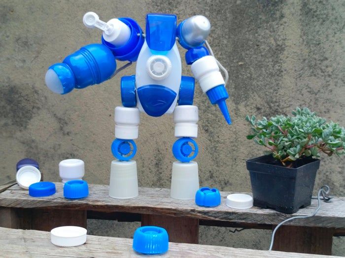 用回收塑料瓶盖制作创意机器人玩具-第2张图片-趣作屋
