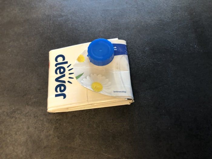 把牛奶盒变成实用钱包的环保教程-第1张图片-趣作屋